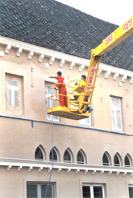 Spraying outside large building